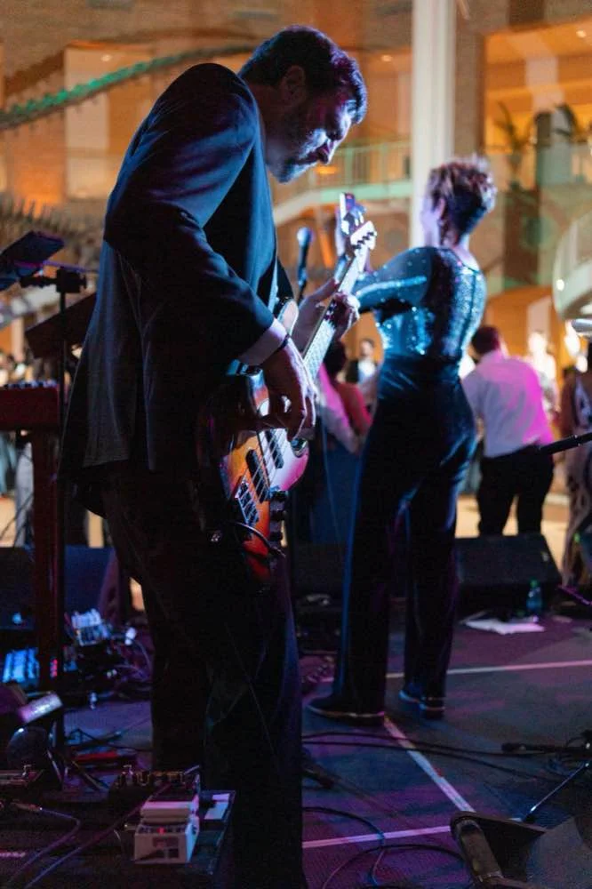 Wedding band bass player performing